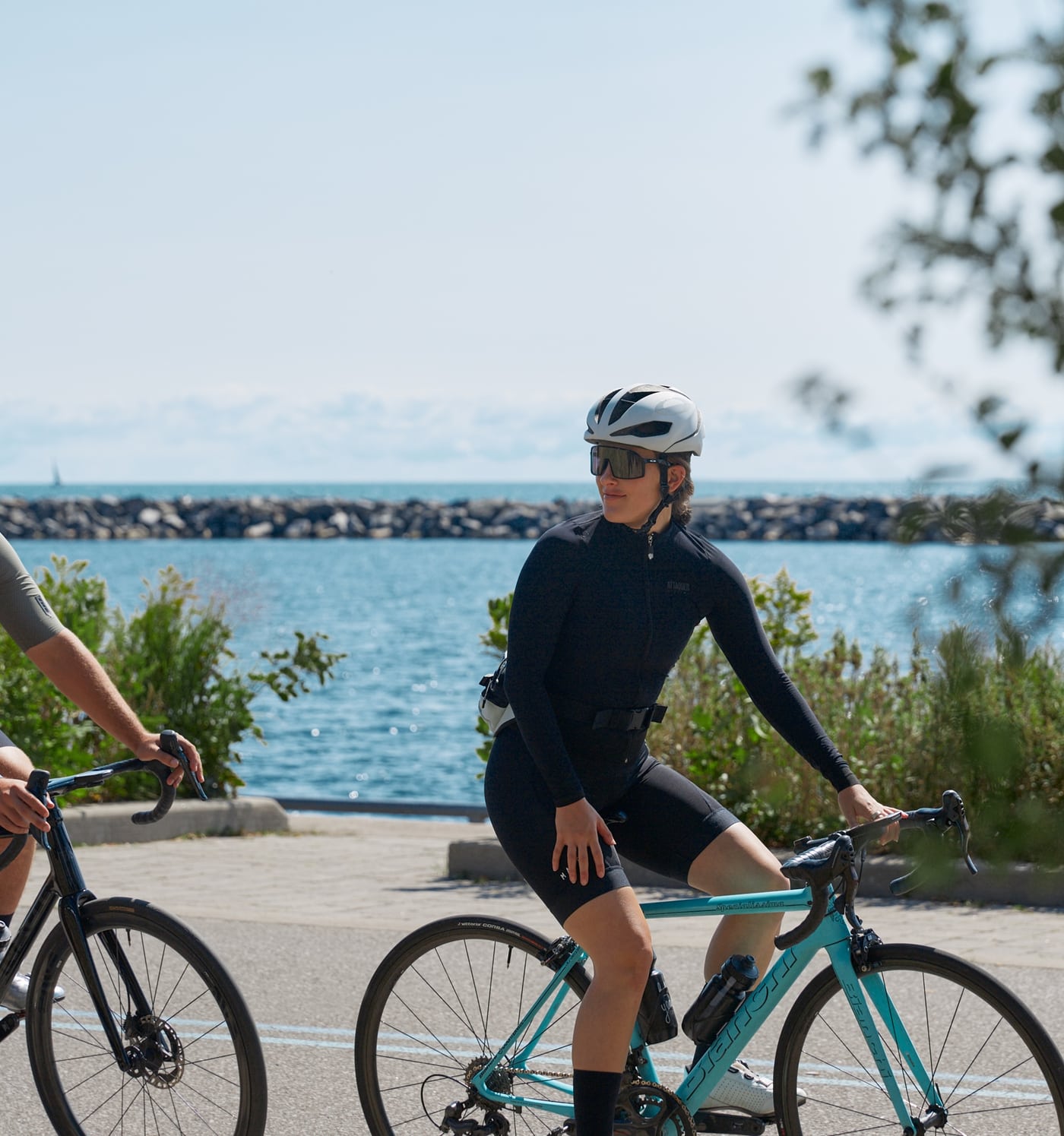 Cyclists on the waterfront trail beside Lake Ontario at Lakeview Village